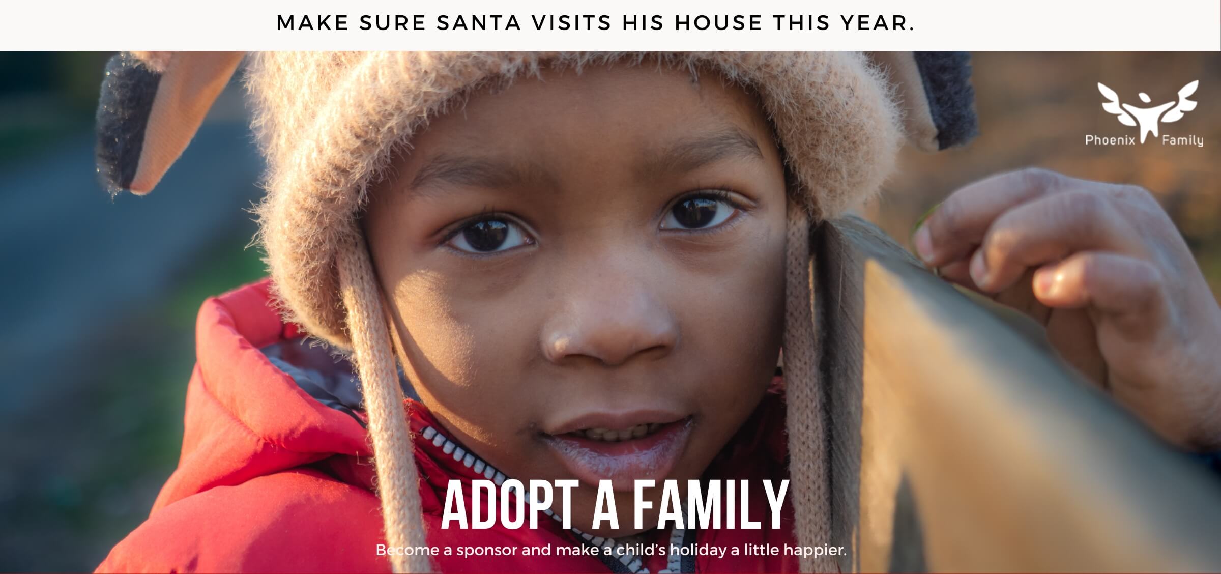 Image of African American child wearing a winter coat and hat looking directly at the camera. Words say: Adopt A Family. Become a sponsor and make a child's holiday a little happier.