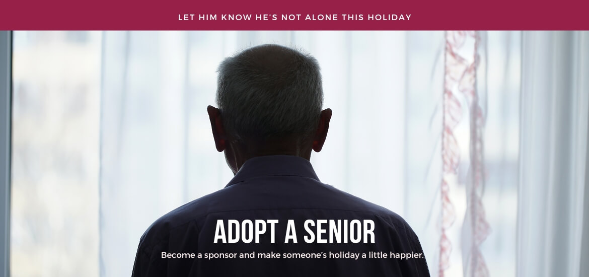 Image of an older adult standing near a window with text saying 'Make sure Santa visits his house this year. Adopt A Senior.'